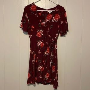 Burgundy dress with flour Detailing